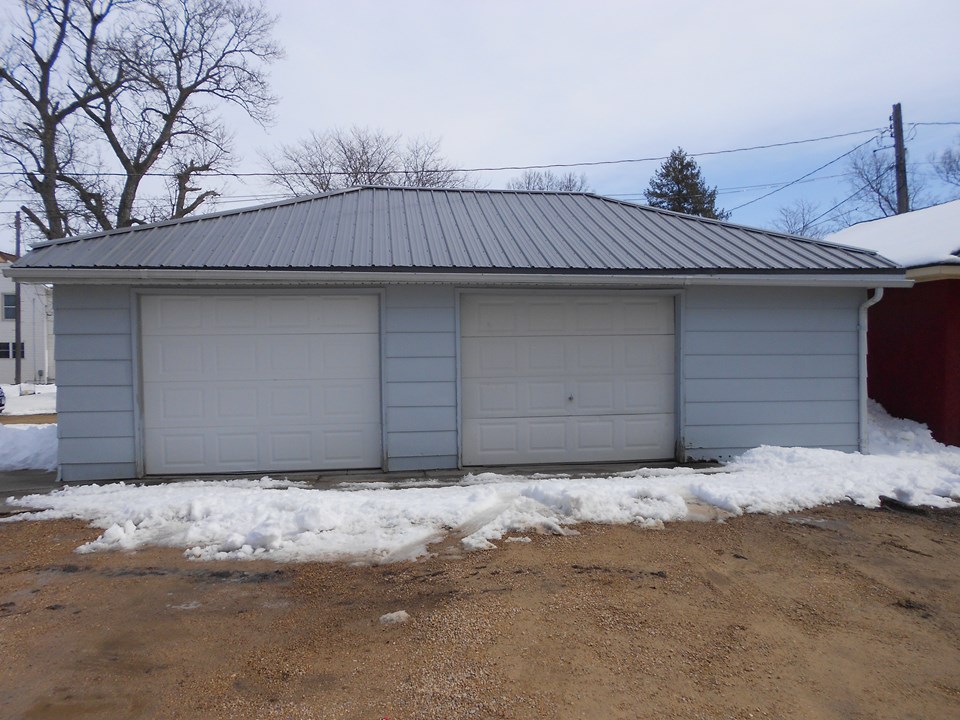 large garage new roof.  garage door openers.  extra storage space.