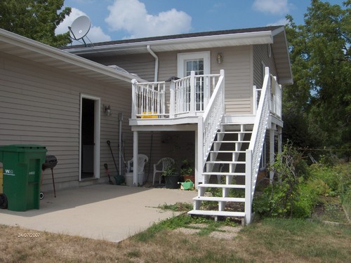 deck off back of house patio doors and deck off of dining room