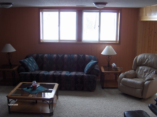 family room this is the area between the fireplace and the pool table.