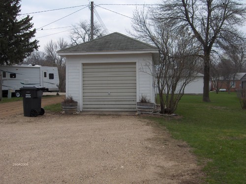 garage alley access to the garage with a garage door opener.