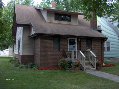 front of house the brick sets this home apart from the others
