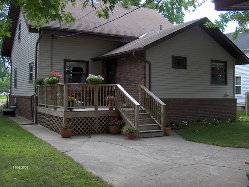 back very private deck and cement patio