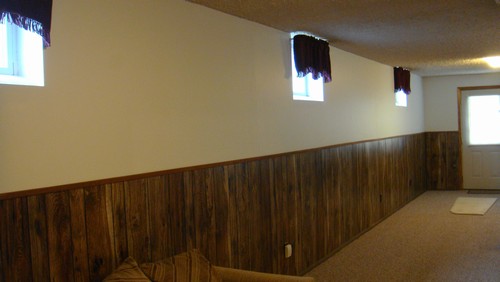 family room walk out door to patio and large garage.
