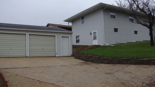 from the back huge 2 car garage and walk out basement.