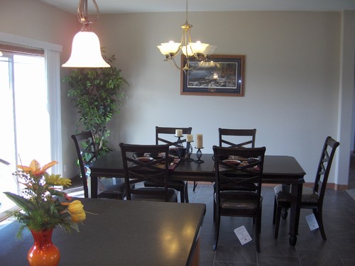 dining area upgraded flooring and patio doors for a deck