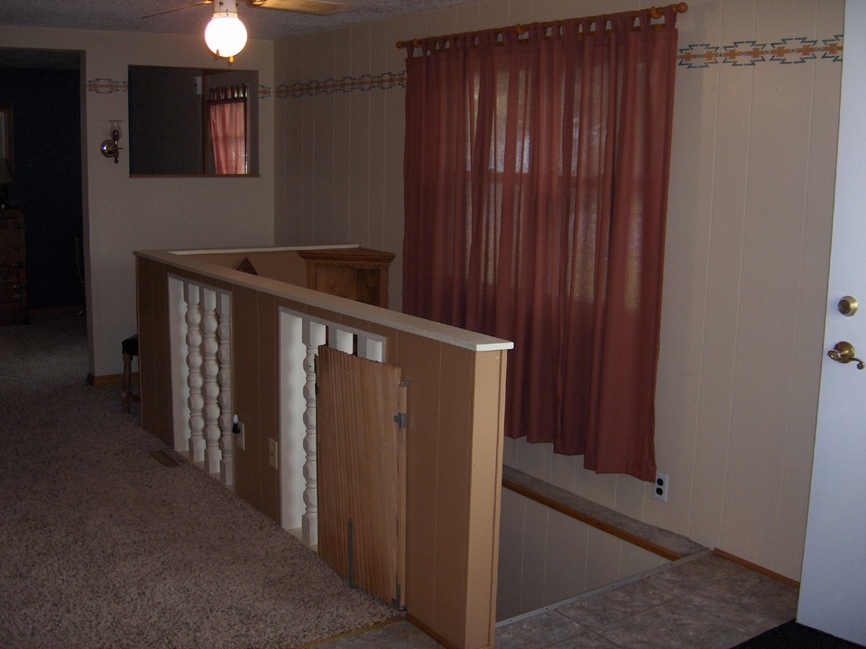open railing to stairs.