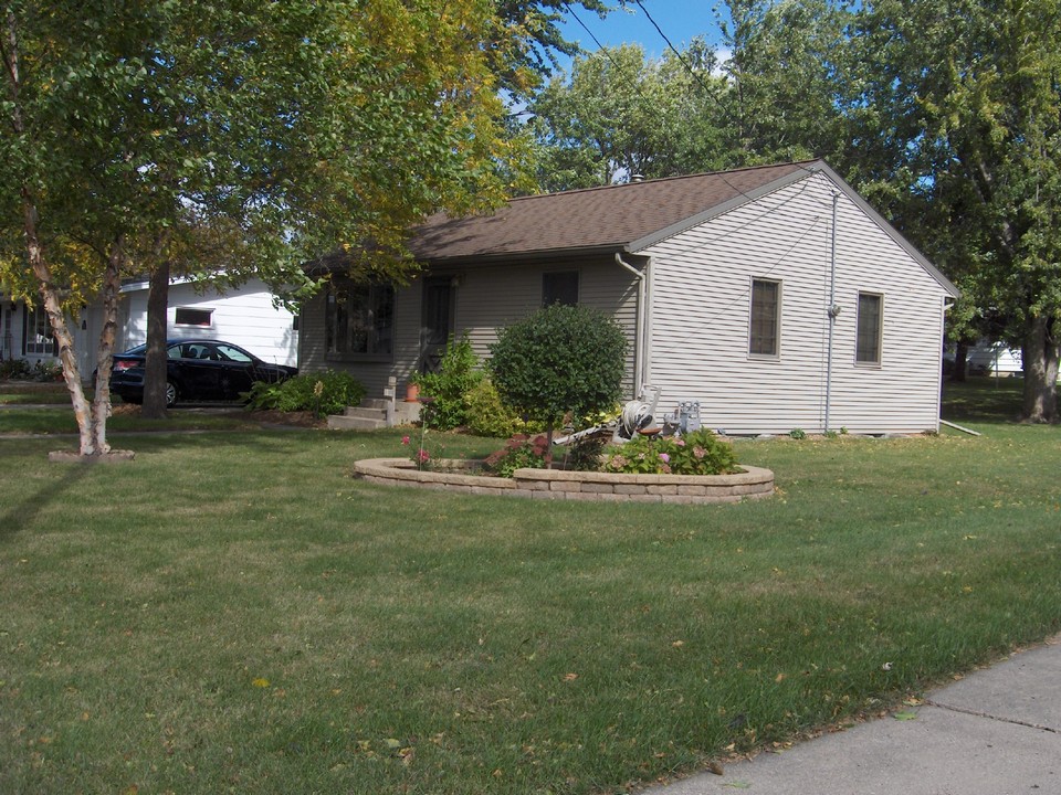 side view with flower garden.