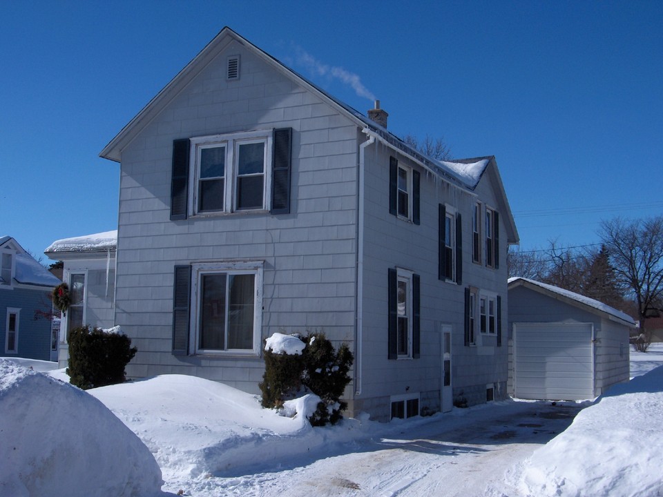 front of house and driveway to front door of garage