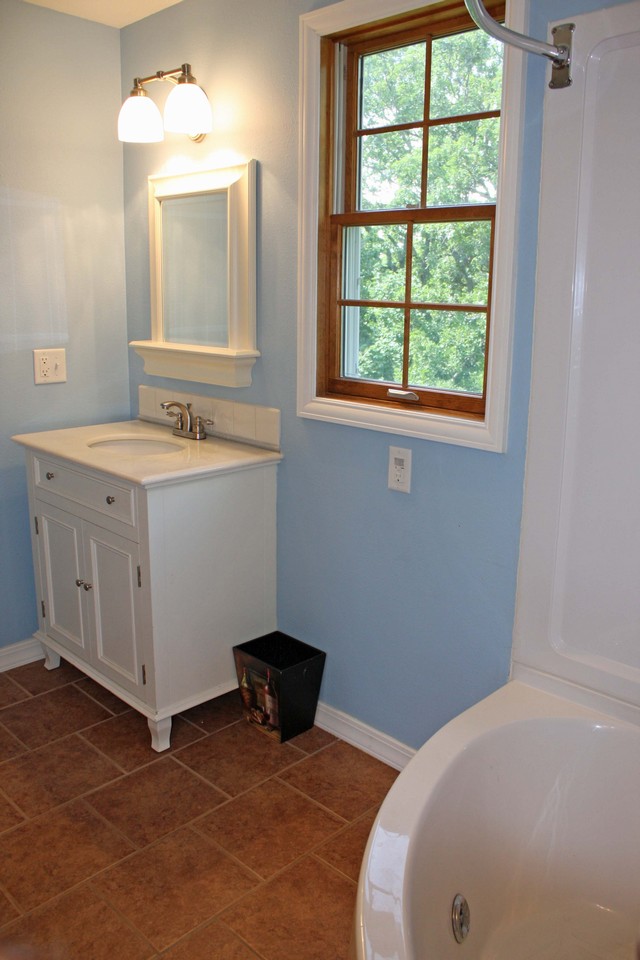main bathroom 2 sinks and jacuzzi tub and shower