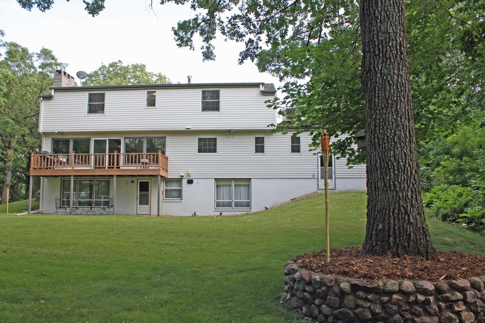 back of house walk out basement.  nicely landscaped.