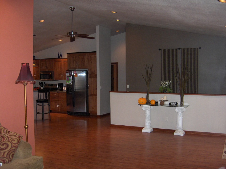 open area living room is open to the dining area and kitchen