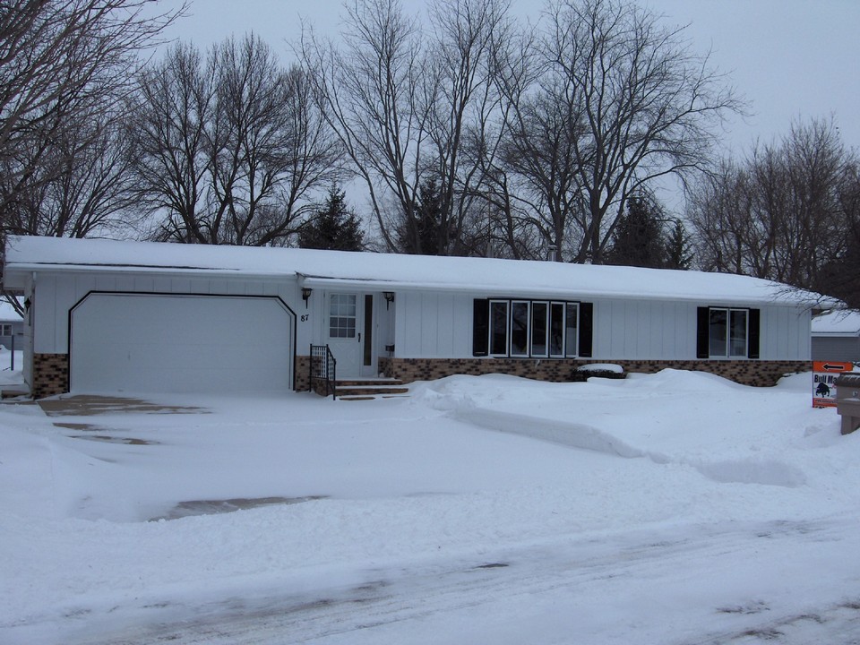 front of house located in very quiet neighborhood.  very nice sized garage.