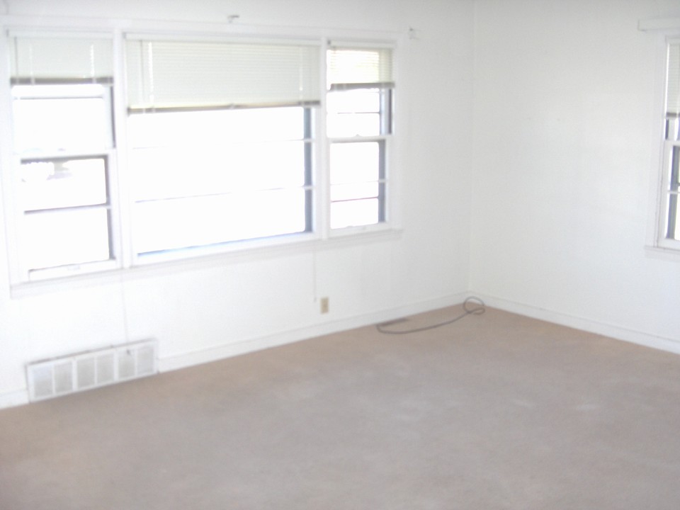 living room with lots of windows