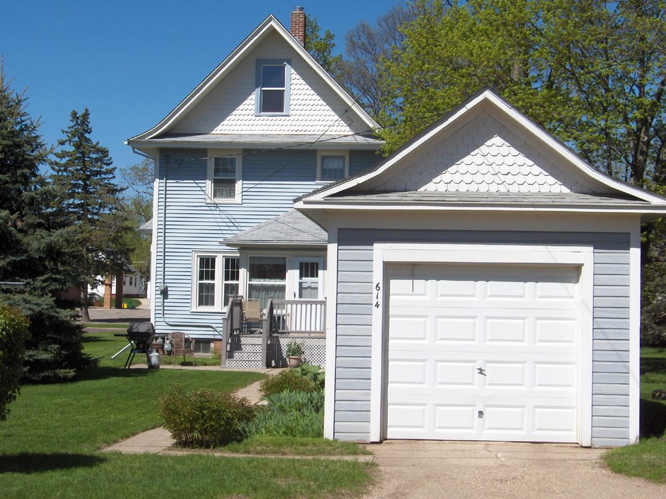 back of home with garage