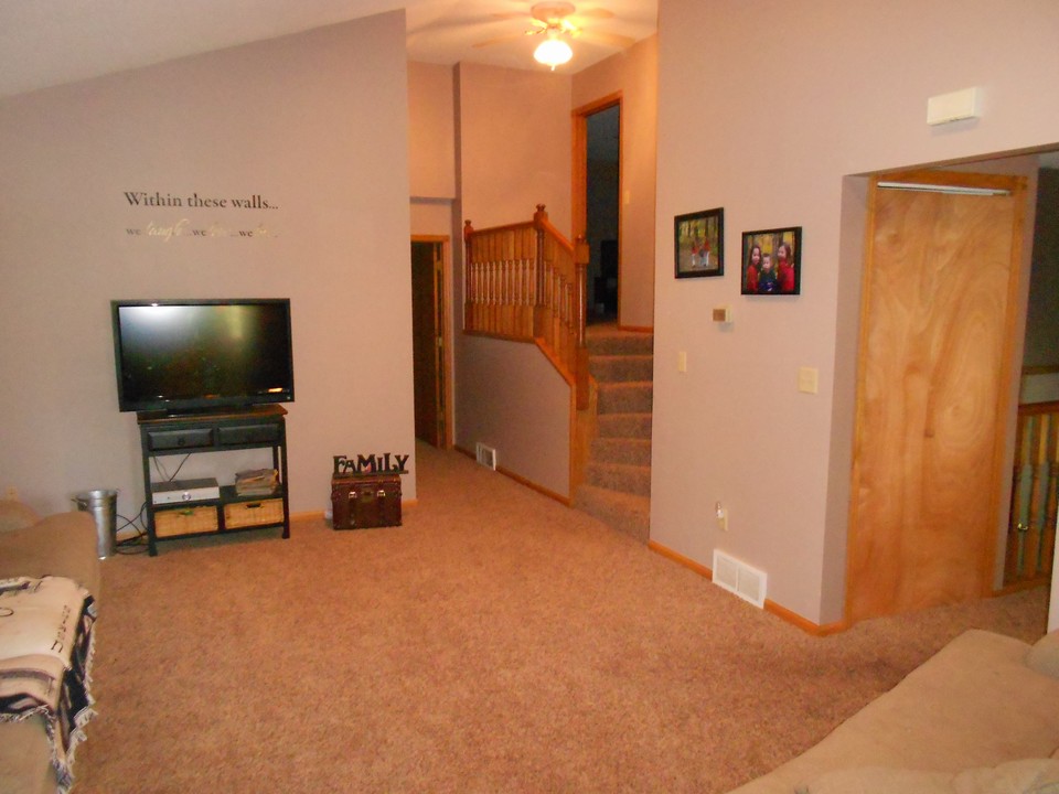 living room with vaulted ceilings