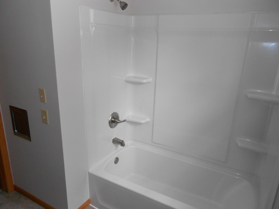 brand new bathroom new tub/shower and surround