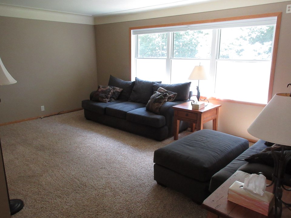 living room nice big windows with custom fit blinds