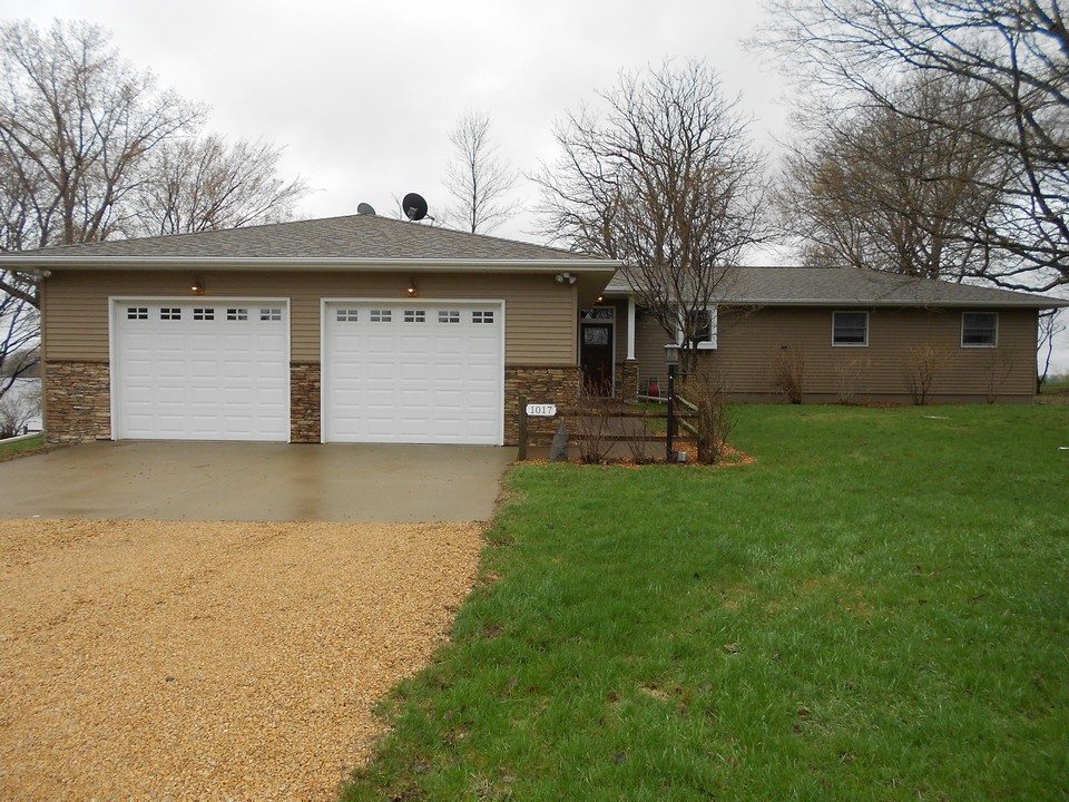 view from the road steel and brick siding.  8 foot garage doors.  large yard.