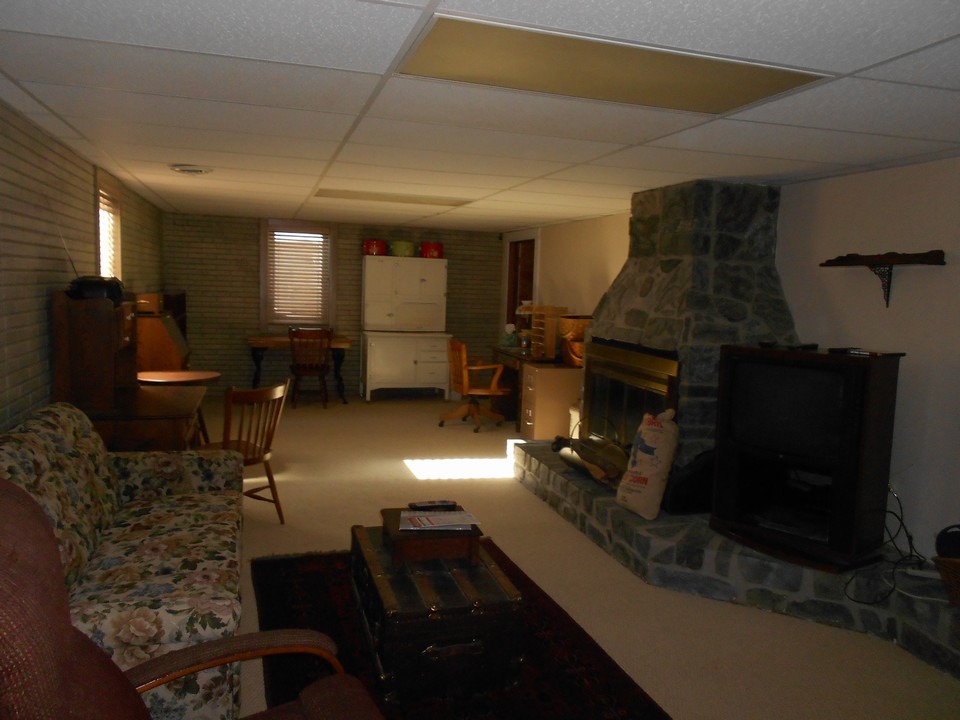 basement family room with egress window.