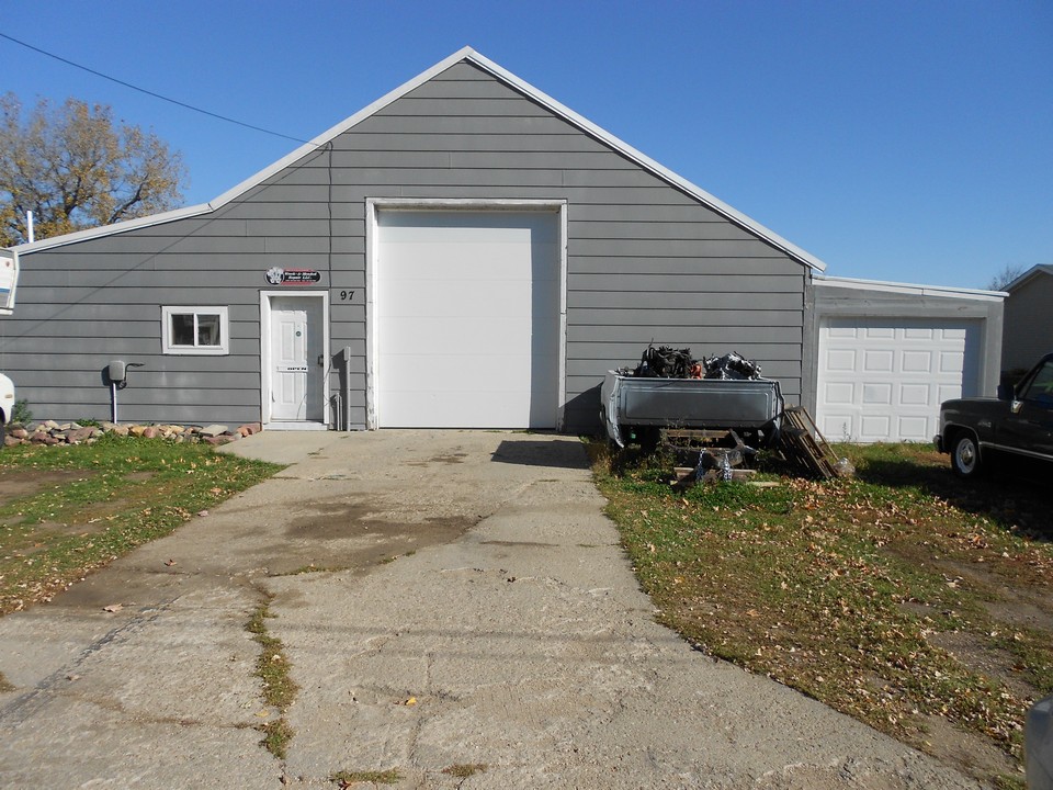 front of building the big door is the main shop area.  the smaller door to the right is the cold storage area.