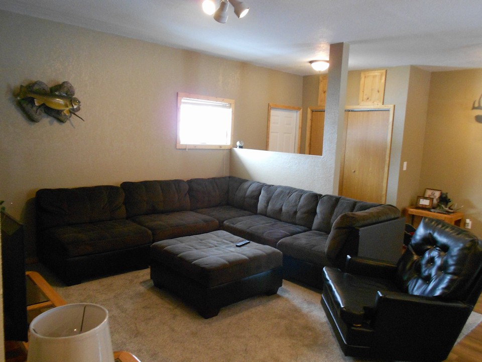 living room and side entry with closet