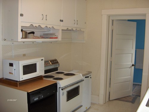 kitchen area across from cupboards