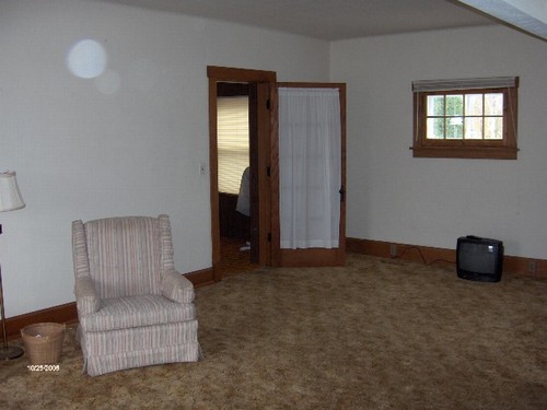 living room this leads to 2 rooms that can be bedrooms or offices or playrooms