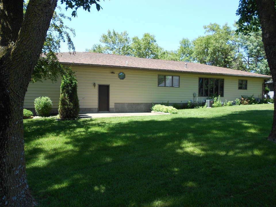 back of home patio and nice windows
