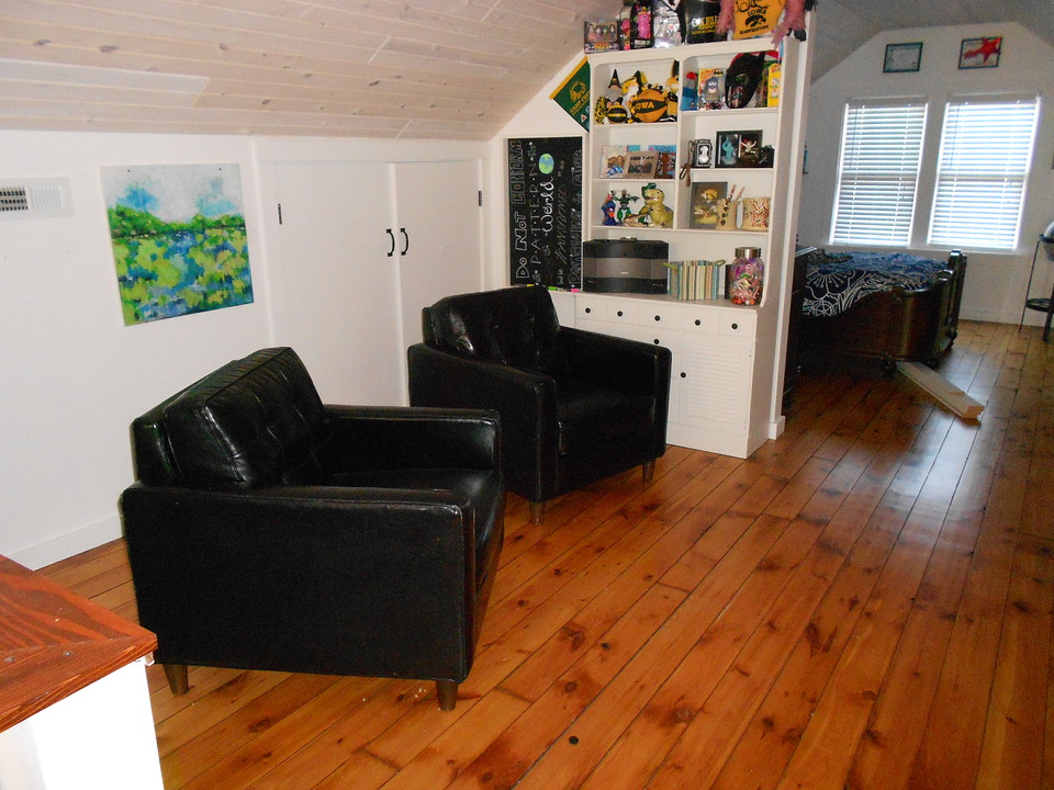 upstairs sitting area lots of storage in the closets