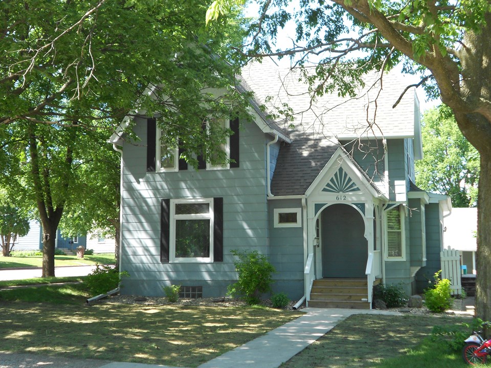 front of home the roof is approx. 5 years old.  the front deck and new sidewalk are very new.