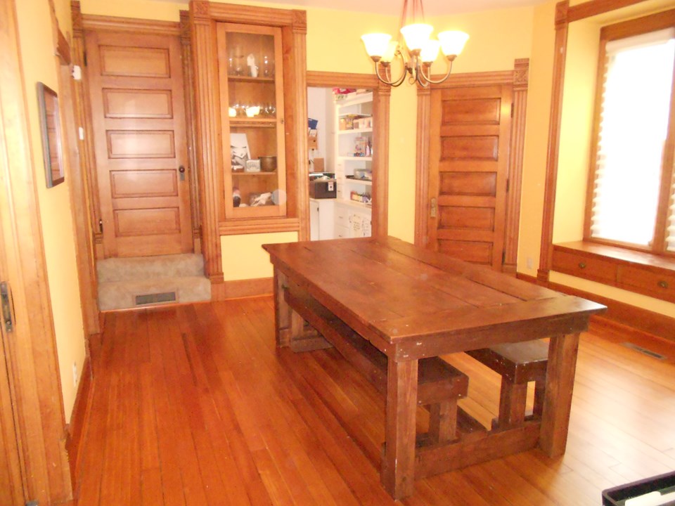 dining room doors lead to upstairs, back porch, and office.