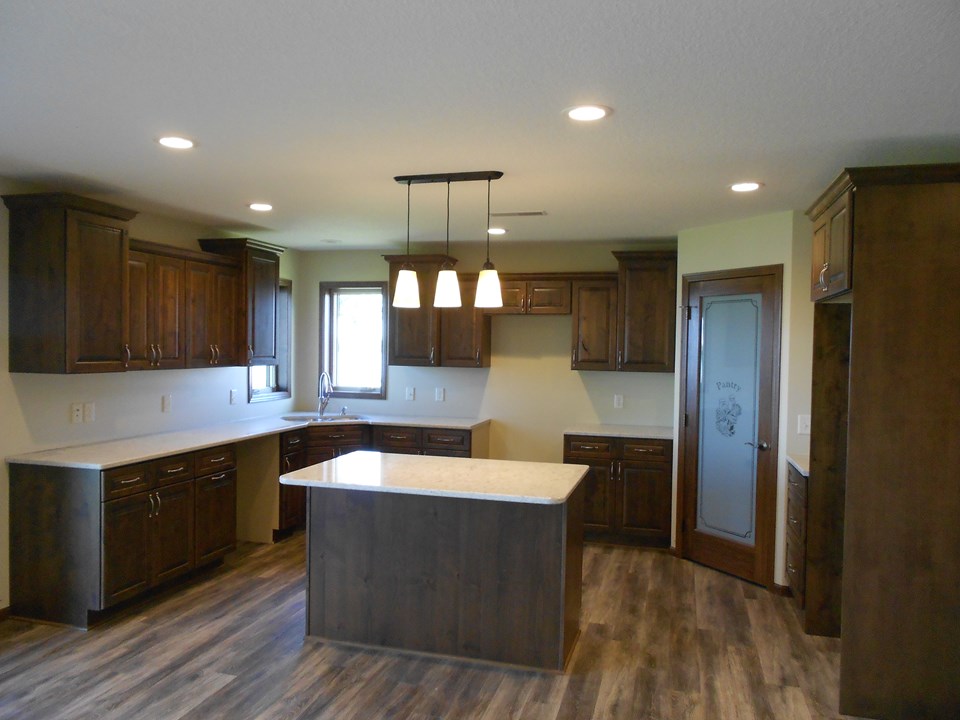 kitchen dura supreme cabinets, quartz countertops, walk in pantry.