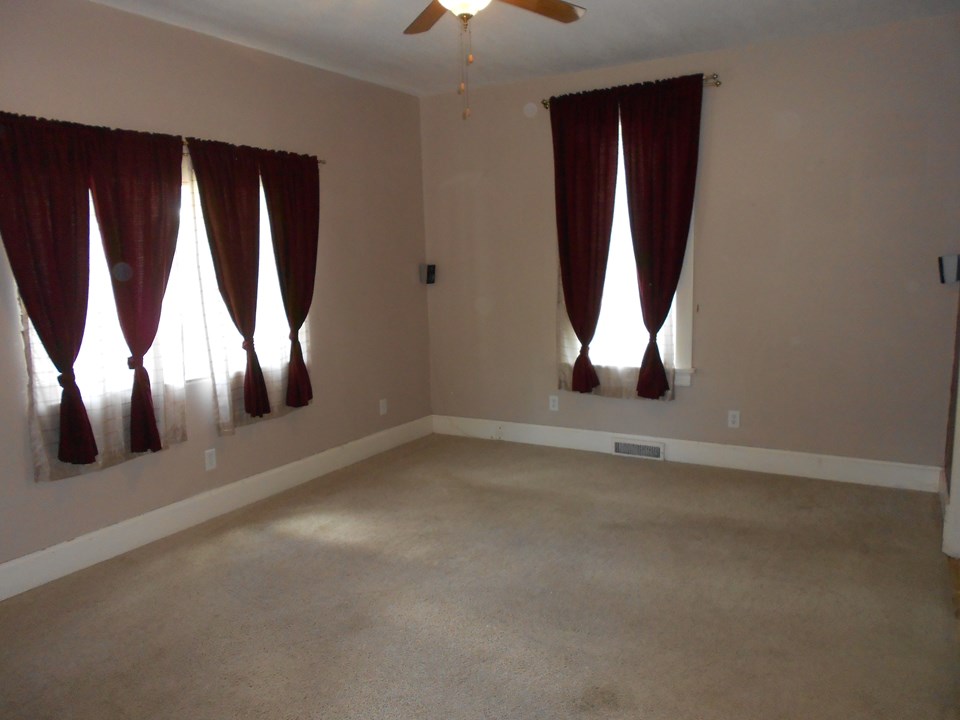 living room large room that leads into the nice dining room.