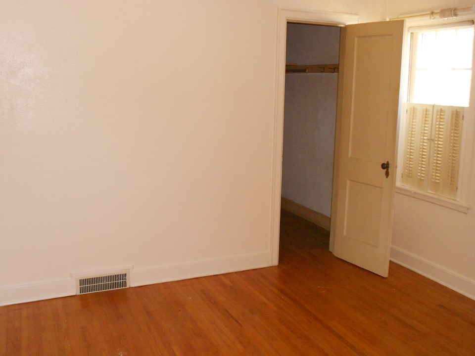 bedroom one hardwood floor