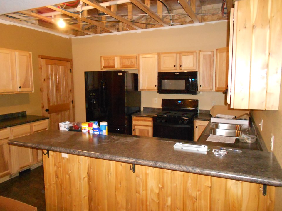 basement kitchen full kitchen with even a dishwasher
