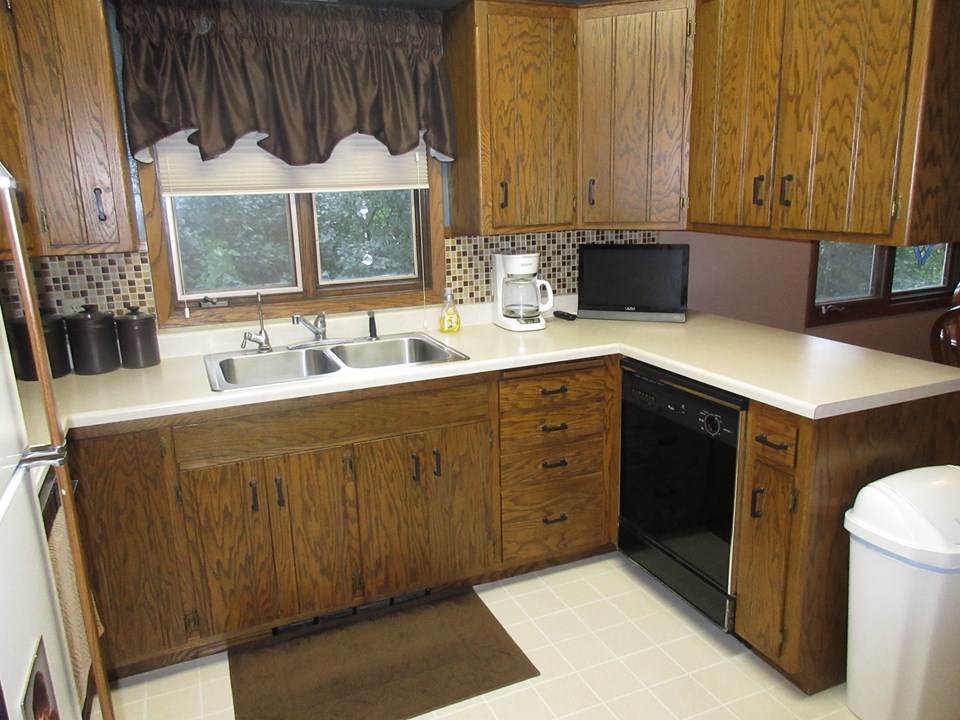 kitchen dishwasher and garbage disposal.