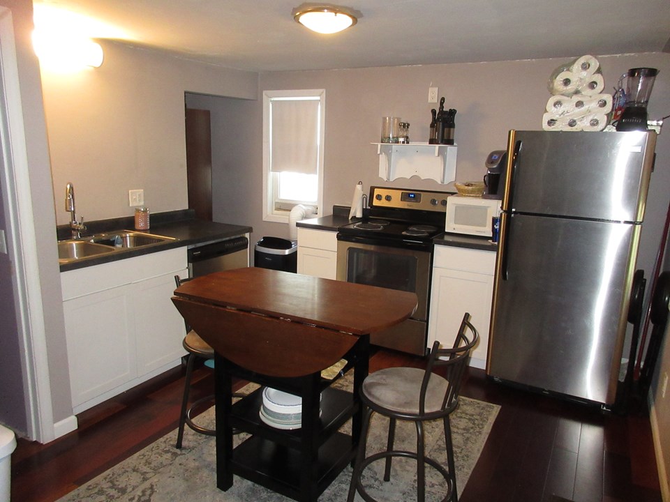 kitchen newer stainless appliances.  new flooring.