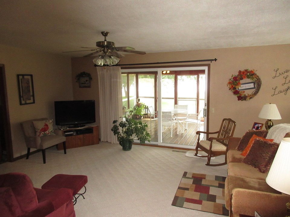family room large doors to the 3 season porch.