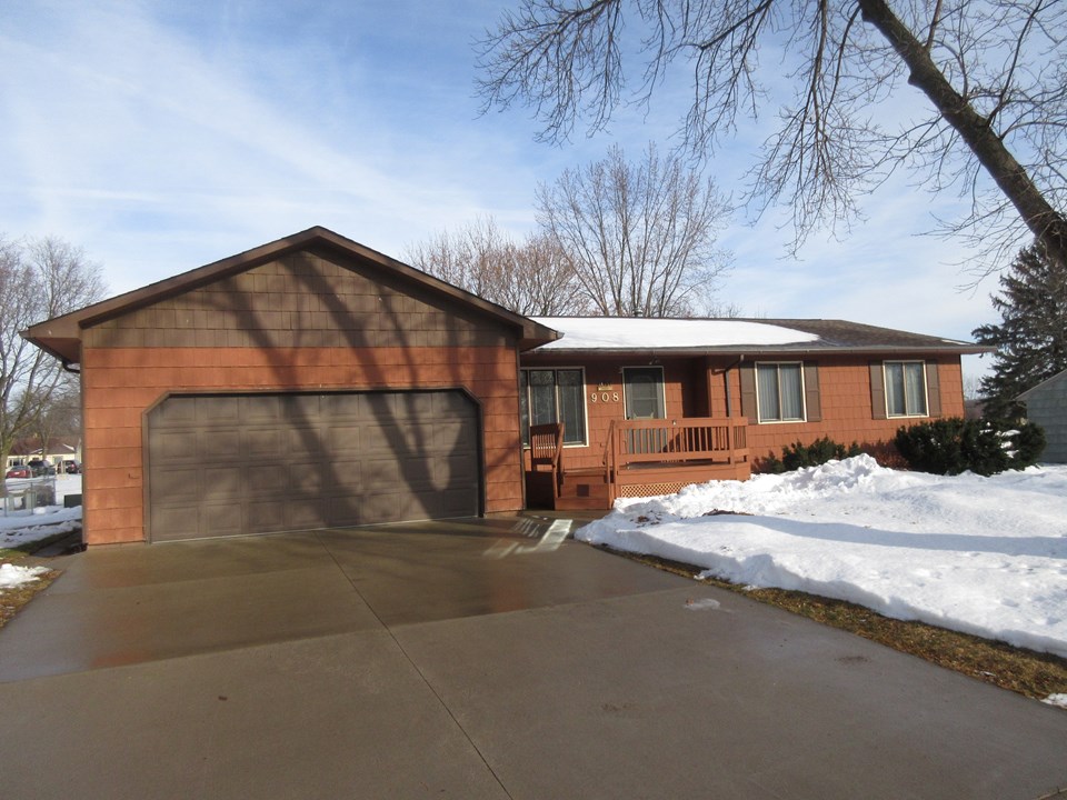 front of home newer driveway, front deck, 2 car attached garage, nice lot, great location, semi private street.