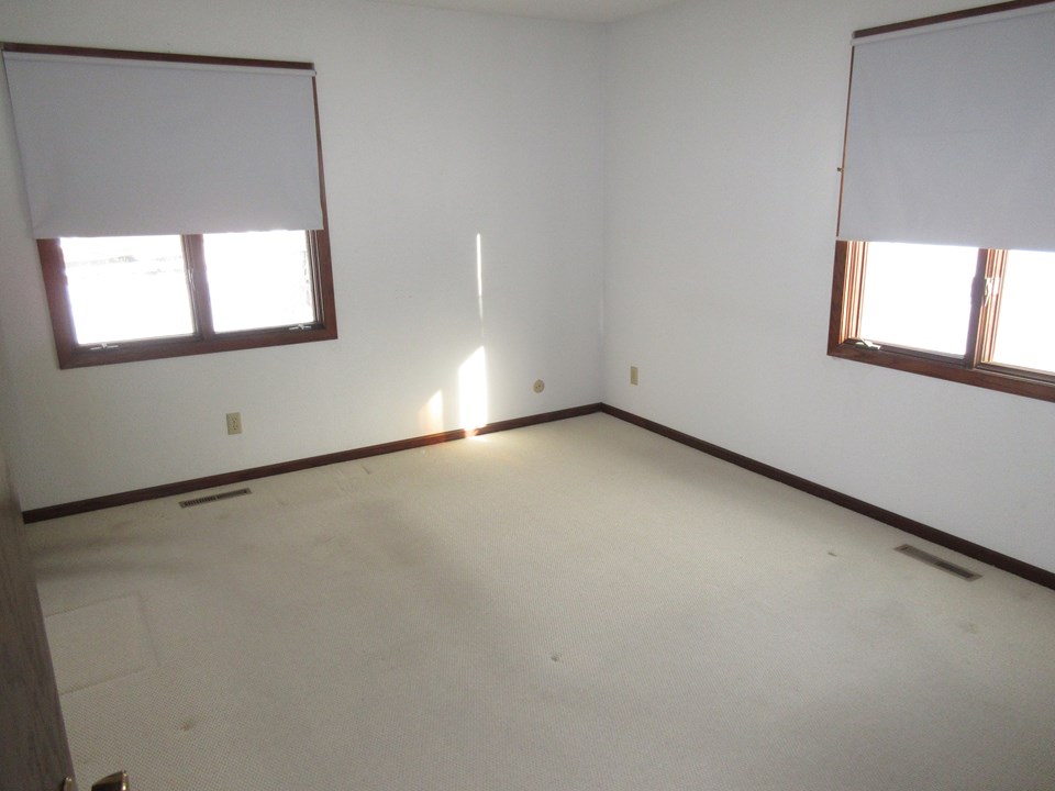 master bedroom has a half bathroom attached.