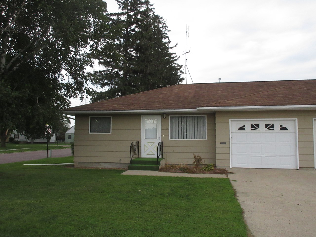 north side of a duplex nice yard in a great location.  attached single garage.