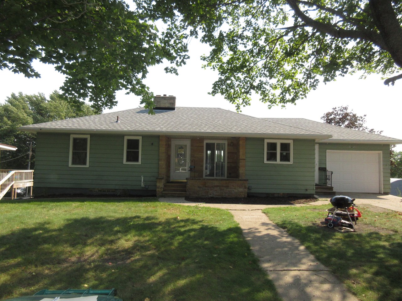 front of home new roof in august 2022.  attached single garage.  corner lot.
