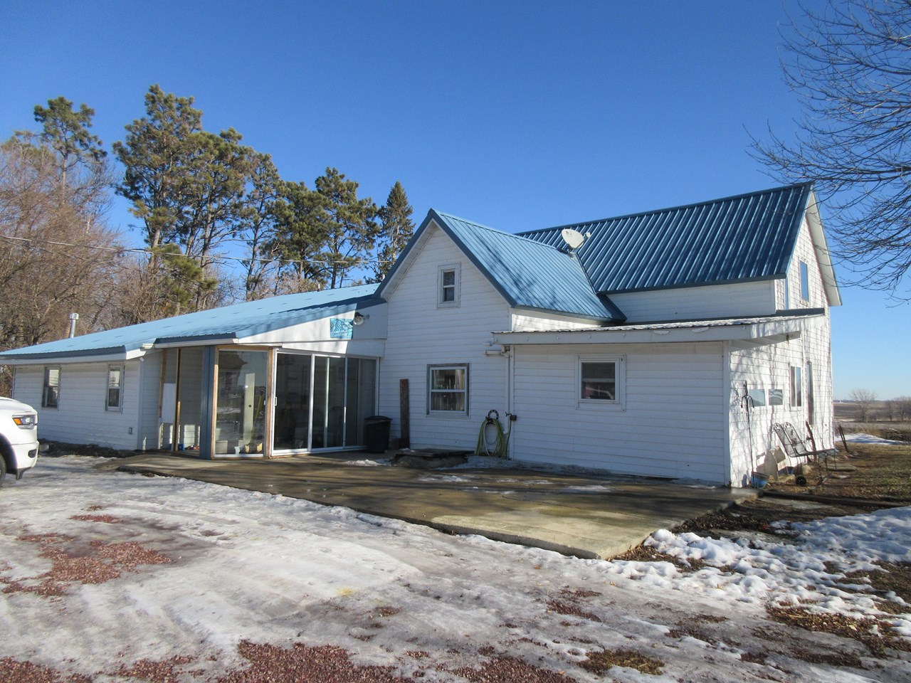 roof is 2 years old.  nice cement patio.  vinyl siding.