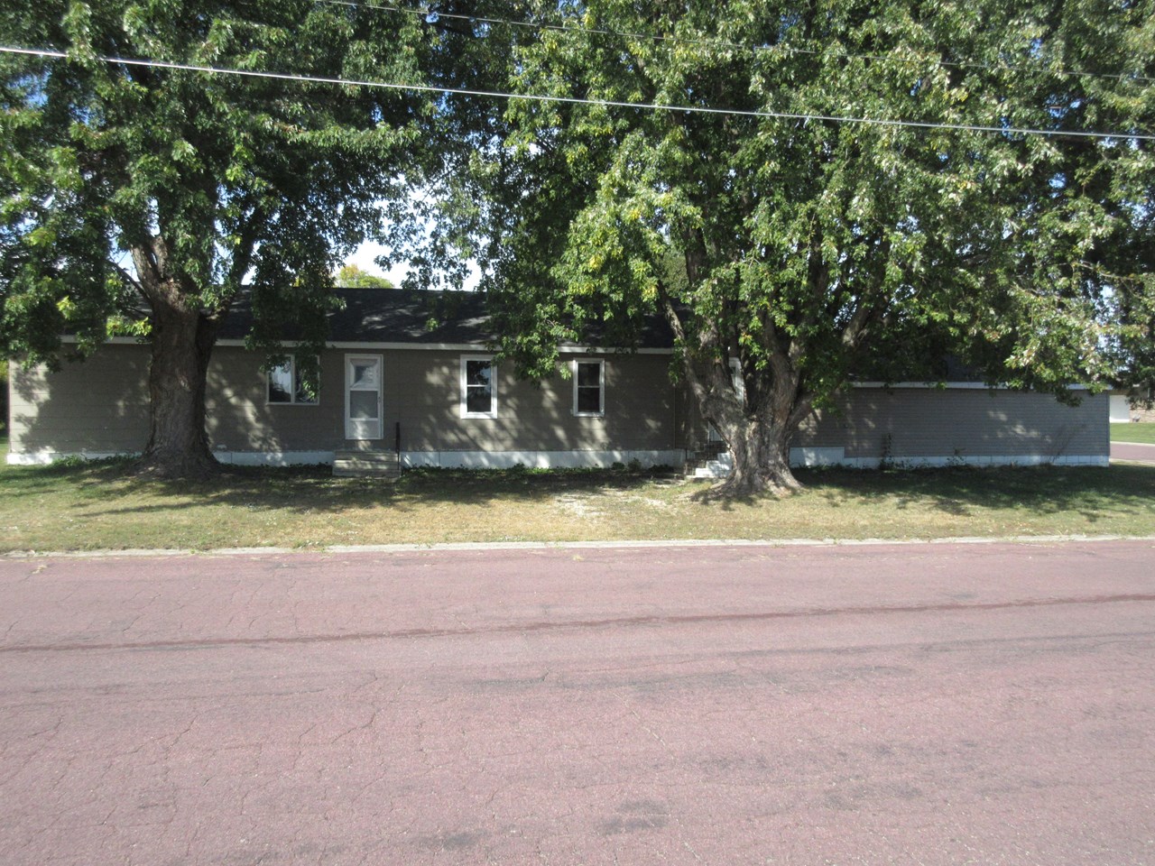 front of larger house