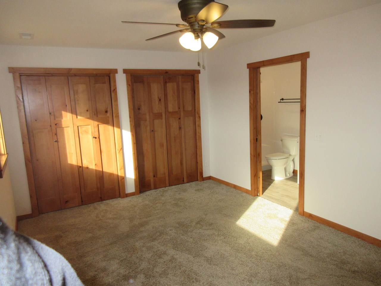 master bedroom full master bathroom and 2 closets.