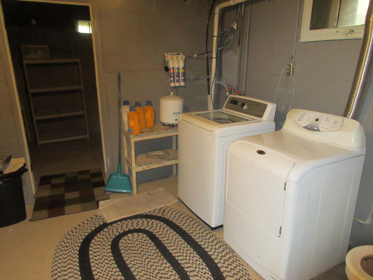 laundry area lots of storage and work areas.