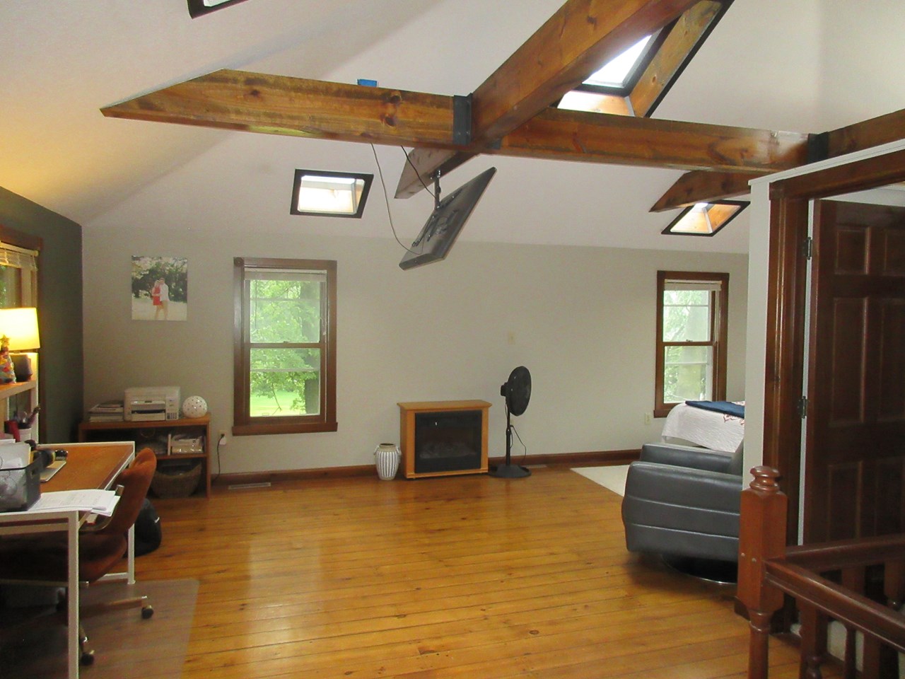 upstairs bedroom nice floors.  skylights.