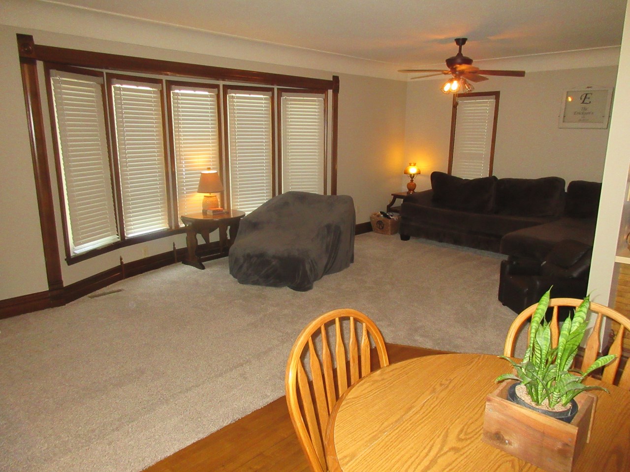 living room lots of windows for natural light.  nice carpeting.  open to the dining room.