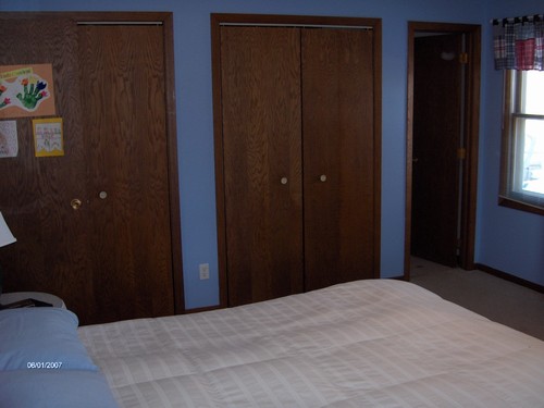 master bedroom. big closets and door to master bathroom.
