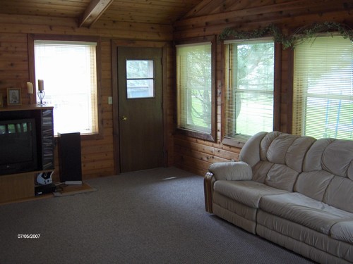 sun room windows all around and access to the back yard.  nice wood work.